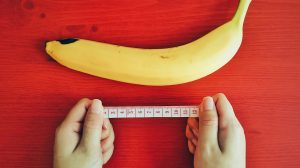 banán, centimétert fogó kéz